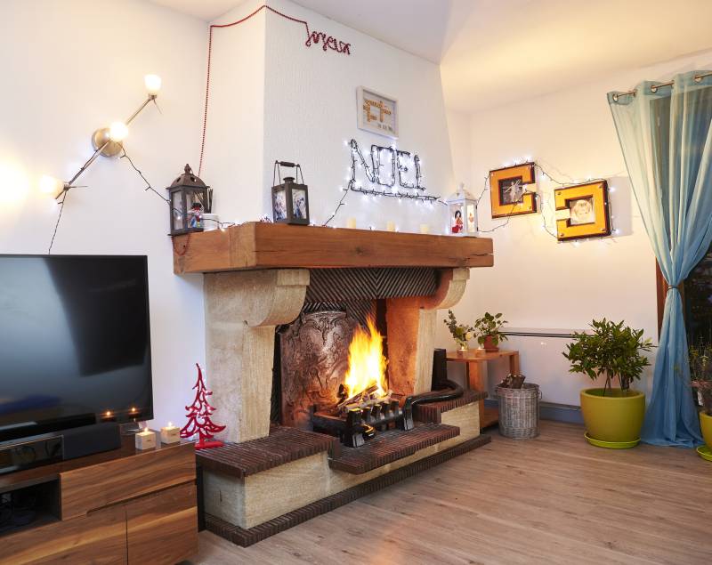 Heat recovery system for open chimneys providing up to 7 kWatt heat    heat