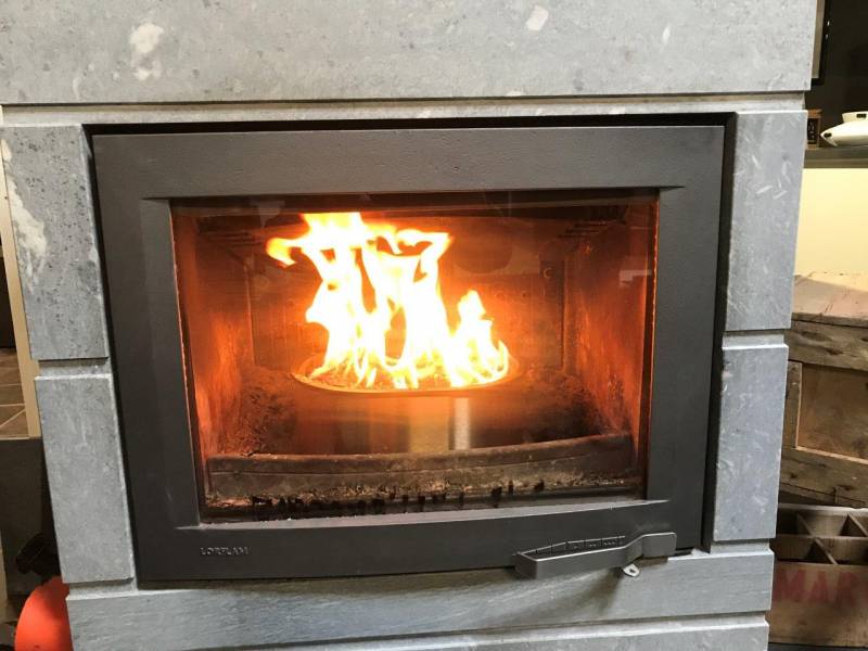 The QAÏTO Q30 in a masonry heater