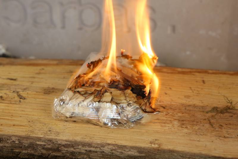 The bag gradually catches fire