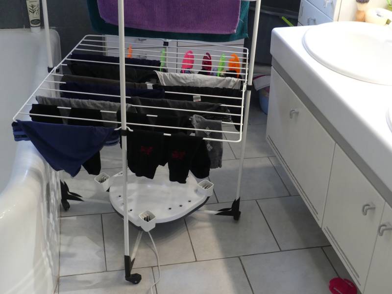 Drying Your Clothes in the Basement With a Low-Energy Air Dryer for Small Urban Spaces